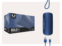Charger l'image dans la galerie, Un haut-parleur bluetooth portable bleu avec des accessoires.
