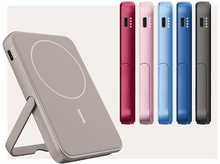 Charger l&#39;image dans la galerie, Une vue latérale d&#39;un téléphone argenté.
