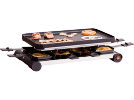 Grill à raclette avec fromage et nourriture. Viande et légumes dessus, fromage dessous.