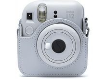 Charger l&#39;image dans la galerie, Appareil photo instantané Instax Mini 12 dans un étui bleu clair. Objectif et flash visibles.
