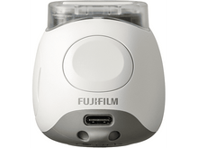 Charger l&#39;image dans la galerie, Appareil photo blanc et arrondi avec le dessus transparent. Logo Fujifilm et port USB.
