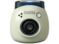 Appareil photo Instax vert avec objectif et flash. Il y a une lumière en haut.