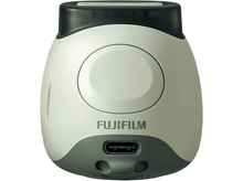 Charger l&#39;image dans la galerie, Une caméra de forme arrondie. La partie supérieure est noire, le reste vert clair.
