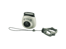 Charger l&#39;image dans la galerie, Un appareil photo Instax vert clair avec une sangle et une poignée.
