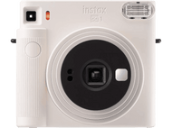 Appareil photo Instax SQ1 blanc. Il a un grand objectif, un flash et un miroir à selfie. L'appareil est carré.