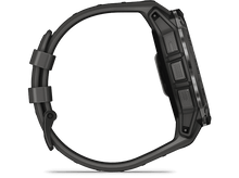 Charger l&#39;image dans la galerie, Smartwatch noire montrant une vue latérale, boutons et bracelet visibles.
