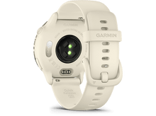 Charger l&#39;image dans la galerie, Montre connectée Garmin, couleur crème, vue arrière. Affiche le capteur de fréquence cardiaque et le système de libération rapide. Texte : Garmin, 42mm, Quick Release.
