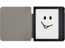 Charger l&#39;image dans la galerie, Liseuse électronique avec un visage souriant est montrée ouverte sur une table.
