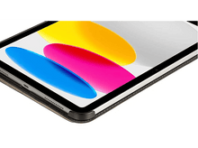 Charger l&#39;image dans la galerie, Gros plan d&#39;une tablette. L&#39;écran affiche des couleurs, partiellement recouvert d&#39;une couverture.
