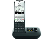 Charger l&#39;image dans la galerie, Un téléphone sans fil noir et blanc avec un affichage numérique indiquant l&#39;heure.
