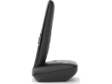 Charger l&#39;image dans la galerie, Téléphone sans fil noir sur fond blanc. Vue latérale, montrant les boutons et la base.
