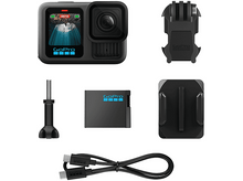 Charger l&#39;image dans la galerie, Une caméra GoPro avec accessoires, dont une batterie, des supports et un câble de chargement.
