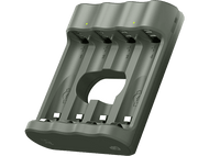 Un chargeur de batterie vert avec quatre emplacements, chacun étiqueté avec un numéro et une icône de batterie. Lumières LED vertes en haut.