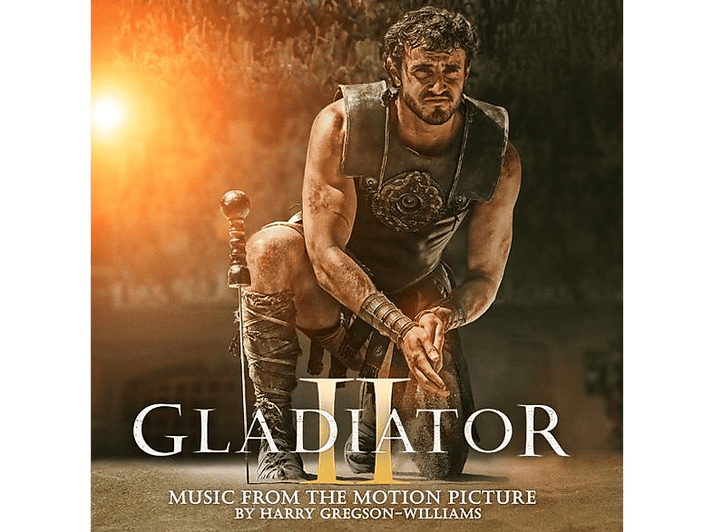 Affiche du film Gladiator II. Un gladiateur s'agenouille avec une épée. Fond sombre.