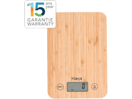 Une balance de cuisine en bambou avec un affichage numérique, indiquant un poids de zéro.