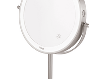 Charger l'image dans la galerie, Gros plan sur un miroir de maquillage rond argenté avec une lumière et un bouton d'alimentation. Fond blanc.
