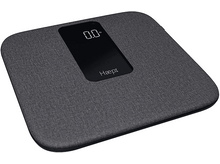 Charger l&#39;image dans la galerie, Une balance numérique grise sur une surface blanche. L&#39;écran affiche &#39;0.0&#39;.
