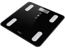 Charger l&#39;image dans la galerie, Gros plan sur la semelle du fer à repasser avec trous et composants internes. Fond blanc.
