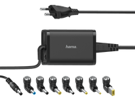 Adaptateur d'alimentation pour ordinateur portable noir avec plusieurs embouts de connecteur et cordon d'alimentation, sur fond noir.