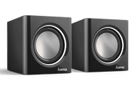 Paire d'enceintes noires, cubiques, avec centres argentés et anneaux blancs.