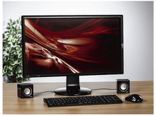 Charger l&#39;image dans la galerie, Configuration informatique avec moniteur, haut-parleurs, clavier et souris sur un bureau en bois.
