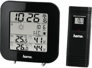 Station météo Hama noire avec affichage numérique. Affiche l'heure, la température, l'humidité et les prévisions.