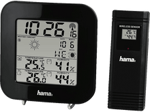 Charger l&#39;image dans la galerie, Station météo numérique noire avec affichage de l&#39;heure, de la date et de la température, plus un capteur.
