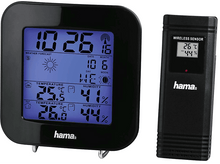 Charger l&#39;image dans la galerie, Une station météo noire avec un écran numérique affichant l&#39;heure, la date et la température.
