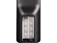 Charger l&#39;image dans la galerie, Arrière d&#39;une télécommande avec un compartiment à piles ouvert. Deux piles AAA sont visibles.
