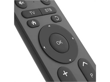 Charger l&#39;image dans la galerie, Gros plan sur une télécommande gris foncé. Elle comporte plusieurs boutons, dont &#39;TV&#39;, &#39;STB&#39; et un pavé de navigation central avec un bouton &#39;OK&#39;.
