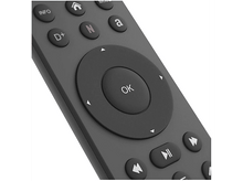 Charger l&#39;image dans la galerie, Gros plan d&#39;une télécommande TV grise. Les boutons incluent &#39;OK&#39;, des flèches directionnelles, &#39;INFO&#39; et autres. La télécommande est inclinée.
