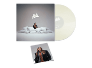 Pochette d'album avec une personne assise sur des oreillers. Un disque est montré à côté de la pochette. Une image plus petite de la personne en costume.