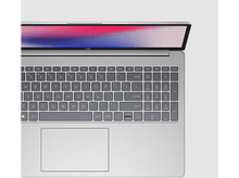 Charger l&#39;image dans la galerie, Un clavier d&#39;ordinateur portable avec un pavé tactile gris et l&#39;écran partiellement ouvert.
