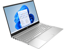 Charger l&#39;image dans la galerie, Ordinateur portable argenté sur une surface blanche. Ouvert, affiche Windows 11.
