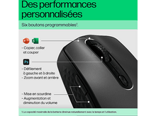 Charger l&#39;image dans la galerie, Gros plan d&#39;une souris noire avec boutons programmables. La souris est sur une surface blanche.
