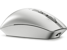 Charger l'image dans la galerie, Une souris blanche avec une molette et un port de charge, sur fond blanc.
