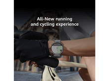 Charger l&#39;image dans la galerie, Une smartwatch au poignet, faisant du vélo, avec le texte : All-New running and cycling experience.
