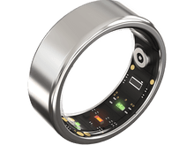 Charger l&#39;image dans la galerie, Bague intelligente argentée avec intérieur noir montrant des composants électroniques, sur fond noir.
