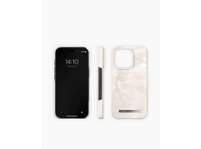 Charger l'image dans la galerie, Trois vues d'un smartphone et d'une coque. La coque est blanche avec un motif marbré, et le téléphone est noir.
