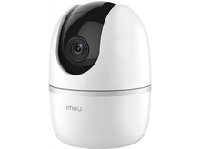 Charger l&#39;image dans la galerie, Une caméra de sécurité blanche et noire. La caméra a un dessus en forme de dôme.
