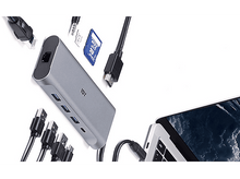 Charger l&#39;image dans la galerie, Hub argenté avec ports USB, différents câbles et un ordinateur portable.
