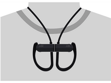 Charger l&#39;image dans la galerie, Écouteurs sans fil noirs autour d&#39;un cou. Les écouteurs sont reliés par un câble noir.
