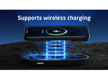 Charger l&#39;image dans la galerie, Un téléphone noir sur un socle de chargement, avec chargement sans fil indiqué par une émission de lumière bleue.
