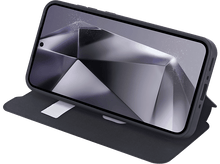 Charger l&#39;image dans la galerie, Smartphone dans un étui gris foncé, ouvert. L&#39;écran affiche une image géométrique abstraite.
