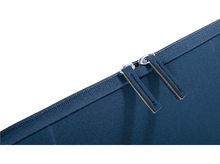 Charger l&#39;image dans la galerie, Gros plan sur un tissu bleu avec deux fermetures éclair métalliques. Tirettes grises.
