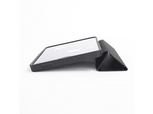 Charger l&#39;image dans la galerie, Une tablette noire dans un étui et un support. La tablette est sur le côté, le support est plié à côté.
