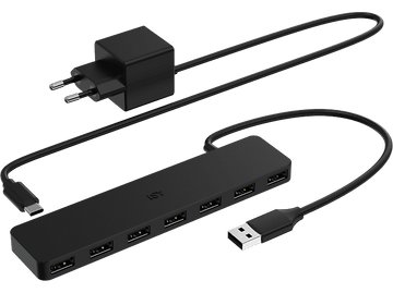 Hub USB et chargeur noirs. Le hub a plusieurs ports USB. Les deux ont des câbles noirs.