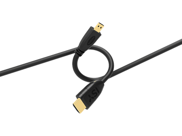 Un câble HDMI noir avec des connecteurs dorés, plié en boucle sur fond noir.