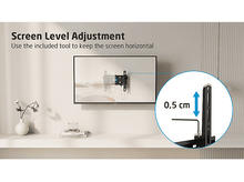 Charger l&#39;image dans la galerie, Un téléviseur est monté sur un mur. Un outil est utilisé pour ajuster le niveau de l&#39;écran.
