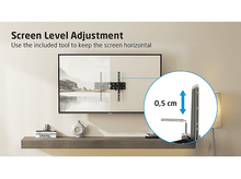 Charger l&#39;image dans la galerie, TV monté au mur avec support. Un outil est présenté pour maintenir l&#39;écran horizontal.
